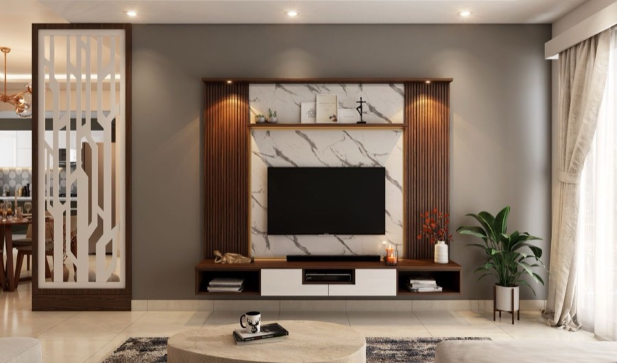 TV centred in a built-in media wall with a soundbar below